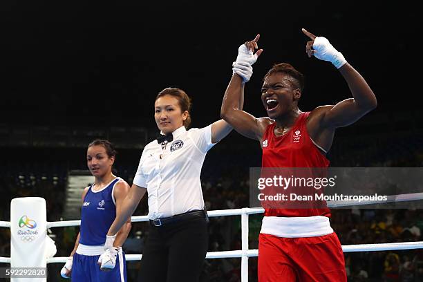 Nicola Adams of Great Britain celebrates winning the gold during the Women's Fly Final Bout against Sarah Ourahmoune of France on Day 15 of the Rio...