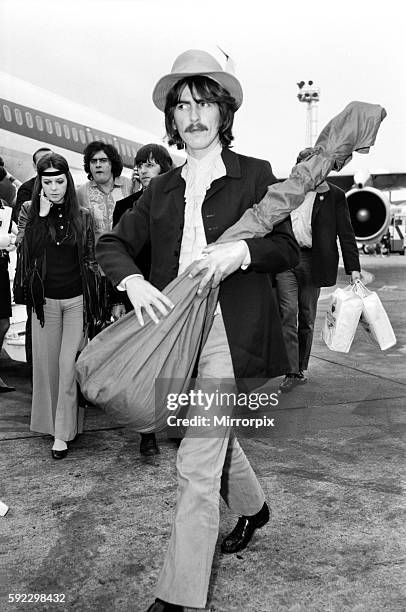 Beatles guitarist George Harrison complete with sitar at Heathrow. June 1968 Y05972-002