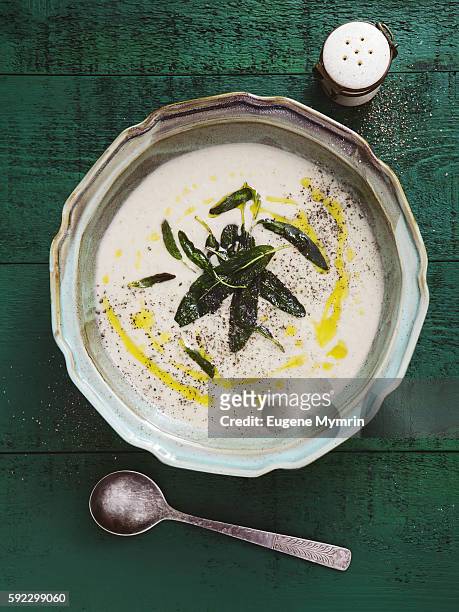 celeriac cream soup with crispy sage - celeriac stockfoto's en -beelden