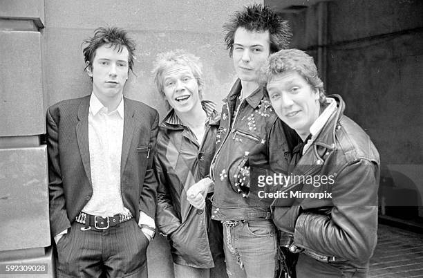 English lead singer, songwriter, and musician John Joseph Lydon, aka Johnny Rotten, drummer Paul Cook, bass guitarist Sid Vicious, born John Simon...