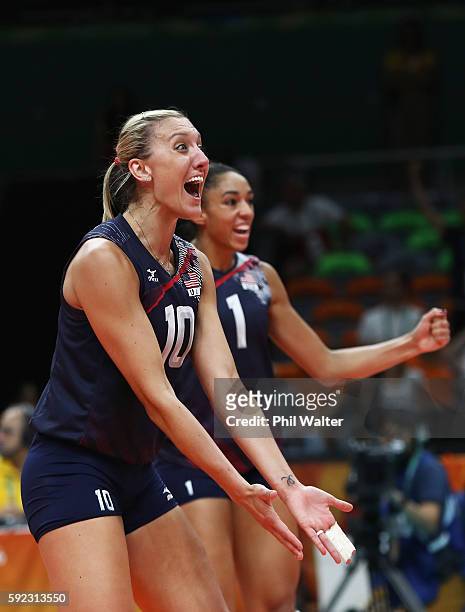 Jordan Larson-Burbach and Alisha Glass of United States celebrate winning the third set during the Women's Bronze Medal Match between Netherlands and...