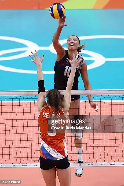 Jordan Larson-Burbach of United States spikes the ball against Yvon Belien of Netherlands during the Women's Bronze Medal Match between Netherlands...