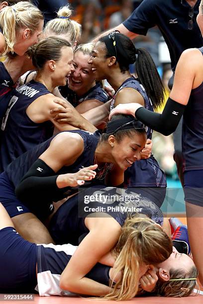 Courtney Thompson, Jordan Larson-Burbach, Foluke Akinradewo, Kelsey Robinson, Rachael Adams of United States celebrate after match point during the...