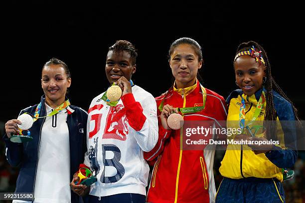 Silver medalist Sarah Ourahmoune of France, gold medalist Nicola Adams of Great Britain and bronze medalists Cancan Ren of China and Ingrit Valencia...