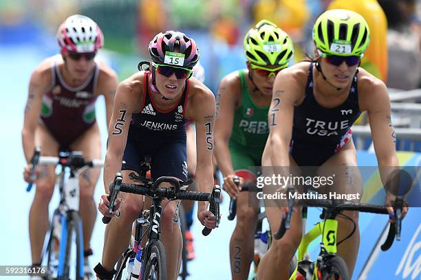 Helen Jenkins of Great Britain and Sarah True of the United States ride during the Women's Triathlon on Day 15 of the Rio 2016 Olympic Games at Fort...