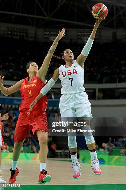 Maya Moore of United States goes to the basket against Laura Nicholls of Spain during the Women's Gold Medal Game between United States and Spain on...