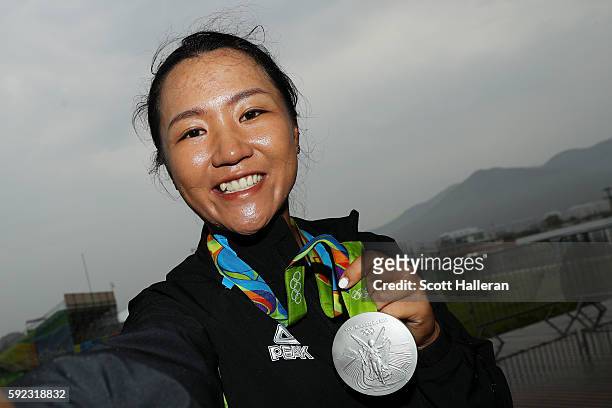 Silver medalist, Lydia Ko of New Zealand, poses for a photo after the Women's Golf on Day 15 of the Rio 2016 Olympic Games at the Olympic Golf Course...