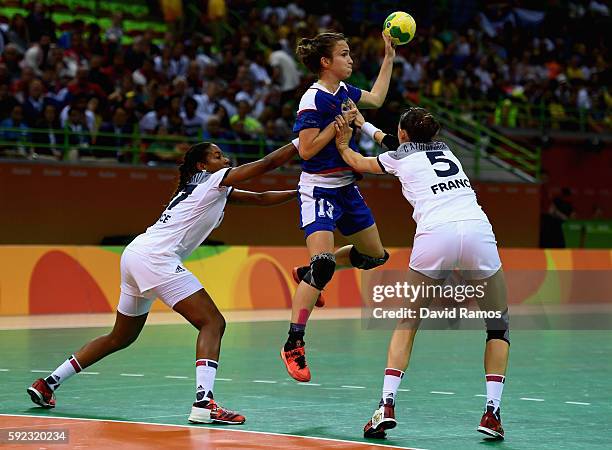 Anna Vyakhireva of Russia passes the ball during the Women's Handball Gold medal match between France and Russia at Future Arena on Day 15 of the Rio...