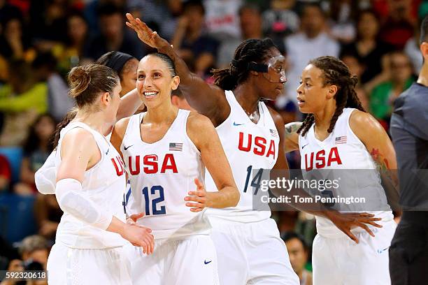 Lindsay Whalen, Diana Taurasi, Tina Charles, Seimone Augustus of United States celebrate a play during the Women's Gold Medal Game between United...