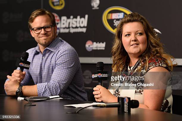 Ashley Montanaro, Manager of Brand and Creative at Aspen Dental management, and Marcus Smith, CEO of Speedway Motorsports, Inc., speak in a press...