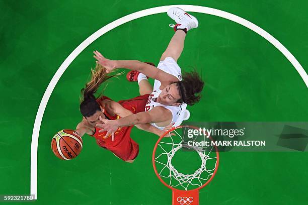An overview shows USA's power forward Breanna Stewart defend against Spain's guard Anna Cruz during a Women's Gold medal basketball match between USA...