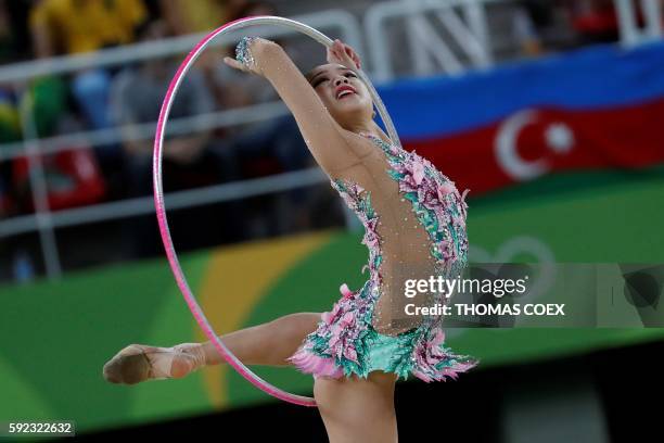 South Korea's Son Yeon Jae competes in the individual all-around of the Rhythmic Gymnastics at the Olympic Arena during the Rio 2016 Olympic Games in...