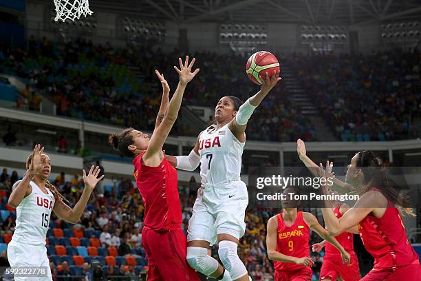 Maya Moore of United States goes to the basket against Laura Nicholls of Spain during the Women's Gold Medal Game between United States and Spain on...