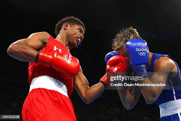 Shakur Stevenson of the United States lands a blow during the Men's Bantam against Robeisy Ramirez of Cuba on Day 15 of the Rio 2016 Olympic Games at...