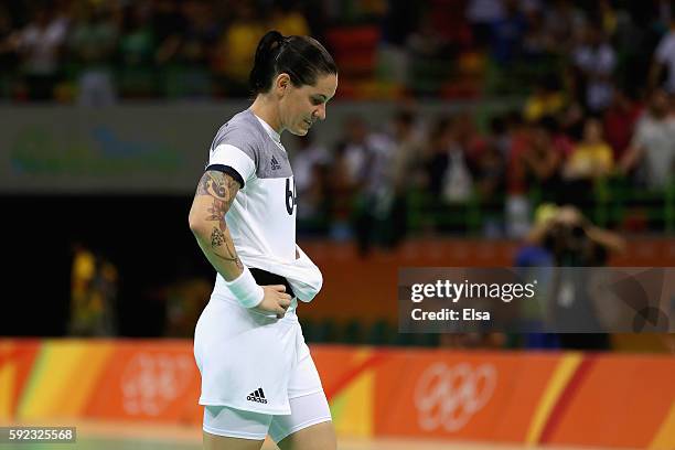 Alexandra Lacrabere of France looks dejected after their defeat in the Women's Handball Gold medal match between France and Russia at Future Arena on...