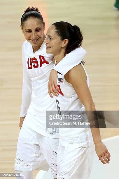 Diana Taurasi and Sue Bird of United States celebrate after winning the Women's Gold Medal Game between United States and Spain on Day 15 of the Rio...