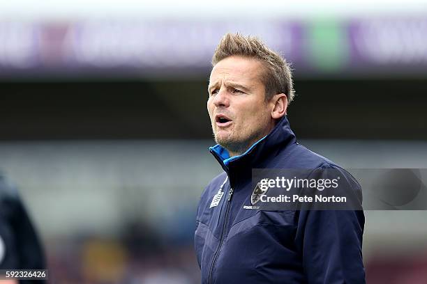 Wimbledon manager Neal Ardley looks on during the Sky Bet League One match between Northampton Town and A.F.C Wimbledon at Sixfields Stadium on...