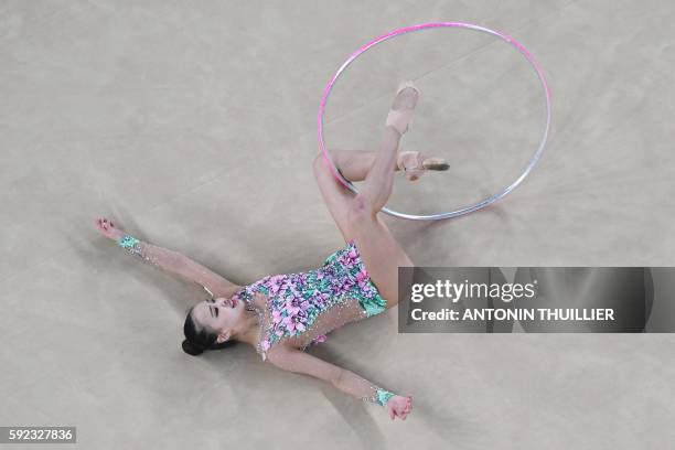 An overview South Korea's Son Yeon Jae shows competing in the individual all-around final event of the Rhythmic Gymnastics at the Olympic Arena...