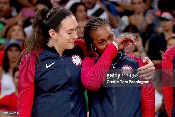 Gold medalists Breanna Stewart and Tamika Catchings of United States celebrate during the medal ceremony after the Women's Basketball competition on...