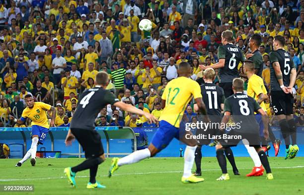 Neymar of Brazil scores the first Brazil goal during the Men's Football Final between Brazil and Germany at the Maracana Stadium on Day 15 of the Rio...