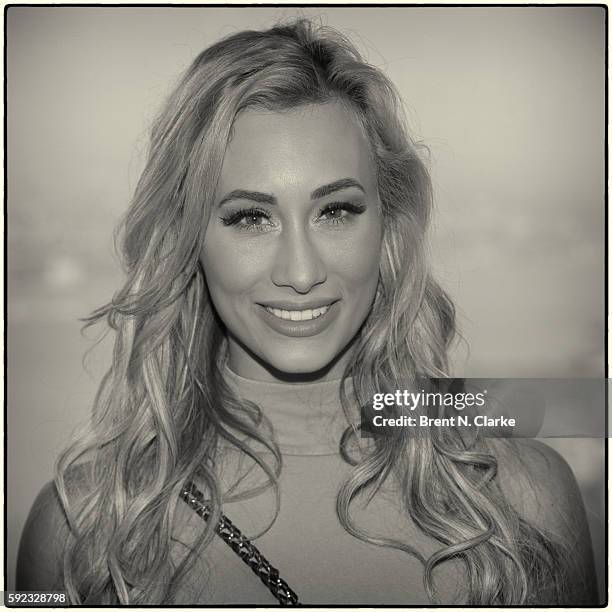 Superstar Carmella poses for photographs during her visit to One World Observatory in advance of SummerSlam on August 20, 2016 in New York City.