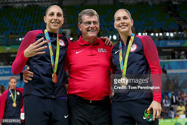 Gold medalists Diana Taurasi, head coach Geno Auriemma and Sue Bird of United States celebrate during the medal ceremony after the Women's Basketball...