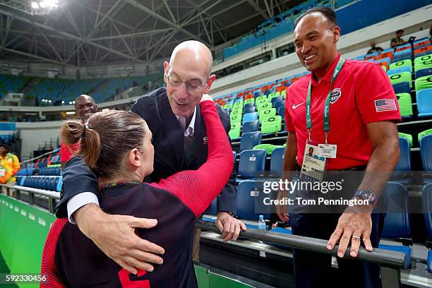 Gold medalist Lindsay Whalen of United States is congratulated by NBA Commissioner Adam Silver after the Women's Basketball competition on Day 15 of...