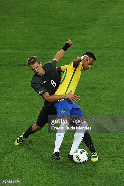 Lars Bender of Germany challenges Neymar of Brazil during the Men's Football Final between Brazil and Germany at the Maracana Stadium on Day 15 of...