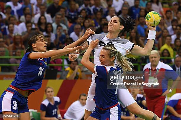 Alexandra Lacrabere of France shoots the ball during the women's Gold Medal handball match France vs Russia for the Rio 2016 Olympics Games at the...