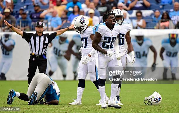 Marqueston Huff of the Tennessee Titans reacts after hitting Kevin Norwood of the Carolina Panthers during the second half at Nissan Stadium on...