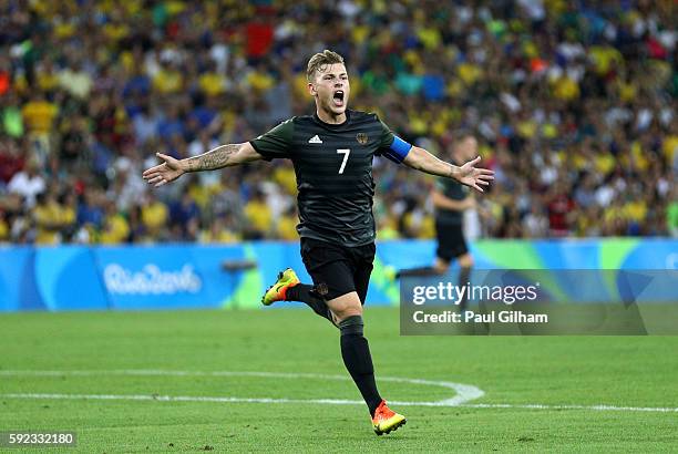 Maximilian Meyer of Germany celebrates scoring during the Men's Football Final between Brazil and Germany at the Maracana Stadium on Day 15 of the...