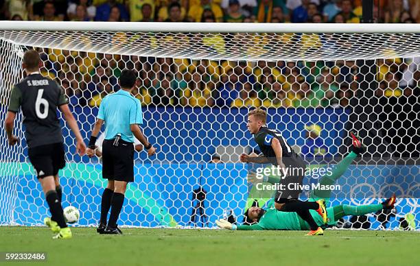 Maximilian Meyer of Germany scores during the Men's Football Final between Brazil and Germany at the Maracana Stadium on Day 15 of the Rio 2016...