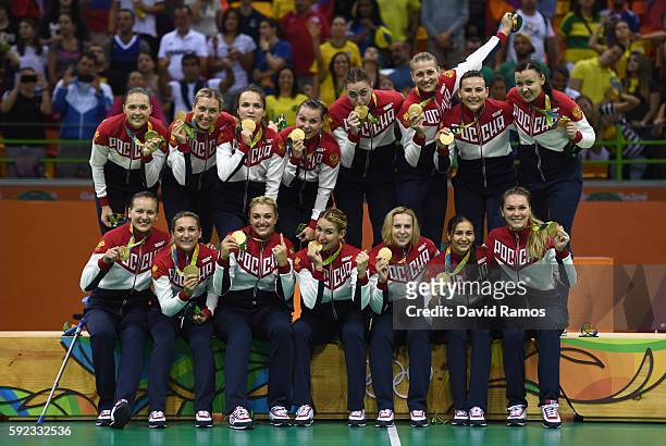 Gold medalists of Russia pose on the podium during the medal ceremony for the Women's Handball contest at Future Arena on Day 15 of the Rio 2016...