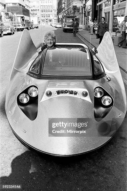 Jon Pertwee, Doctor Who , filming scenes for new Doctor Who episodes, in Moorgate, London, 23rd September 1973. The car has a basic Hillman Imp...