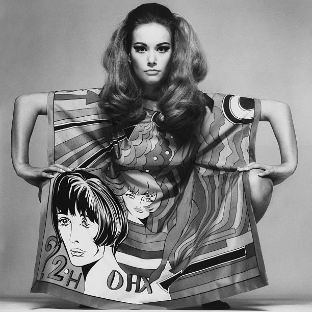 Actress, Claudine Auger in Roy Lichtenstein print poncho by Biki with silk fabric by Yermi di Como