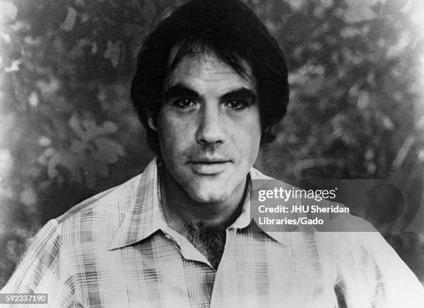 Headshot of American comedian, singer, and actor Robert Klein wearing a gingham collared shirt at Spring Fair, a student-run spring festival, at...