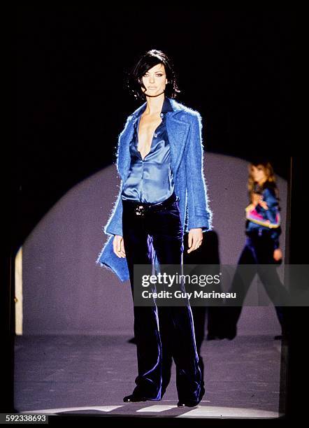 Model walks Gucci's RTW Fall 1995 Runway collection designed by Tom Ford.