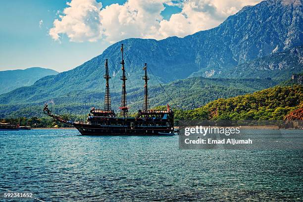 tour ship off the coast of phaselis, antalya, turkey - kemer stock-fotos und bilder