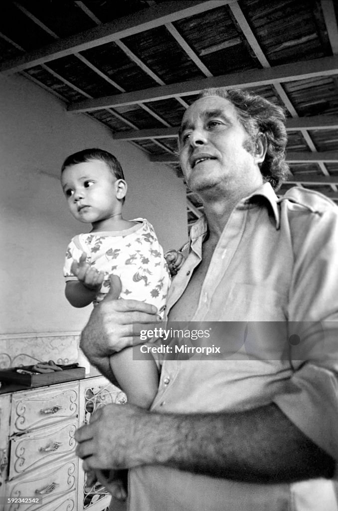 Great Train Robber, Ronald Biggs and Baby: Ronald Biggs seen here in his new beach hideout in Brazil.