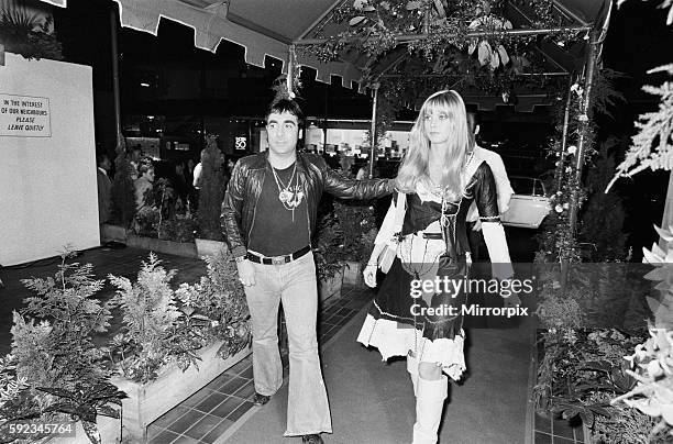 Keith Moon, drummer of the British rock group The Who, attending the the premier of the new film "The Buddy Holly Story" in the West End with fiancee...