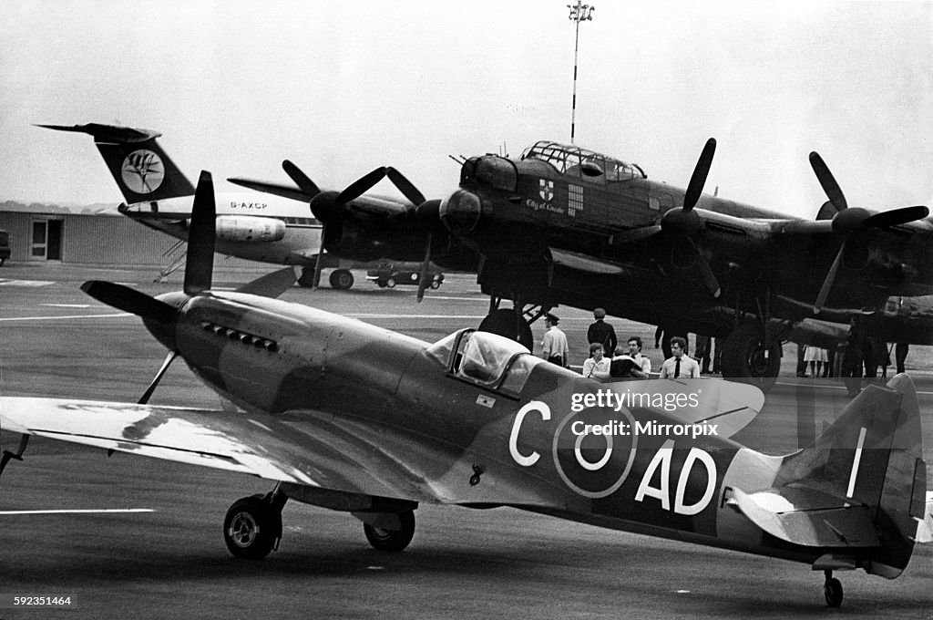 A Supermarine Spitfire Mk PRXIX and Avro Lancaster of the Battle of Britain Memorial Flight at Newcastle Airport.