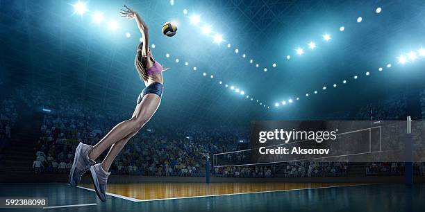 volleyball: female player in action - volleying stock pictures, royalty-free photos & images