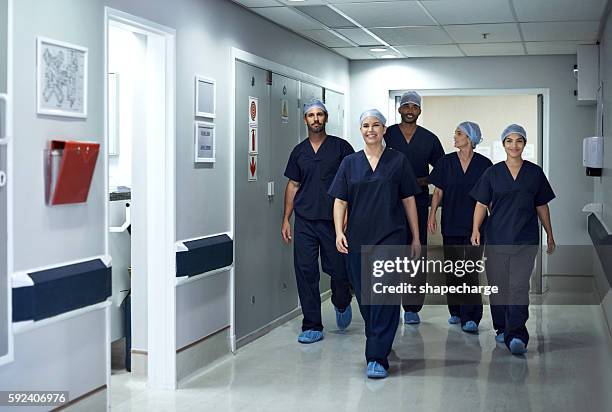 another successful procedure - surgeon walking stock pictures, royalty-free photos & images