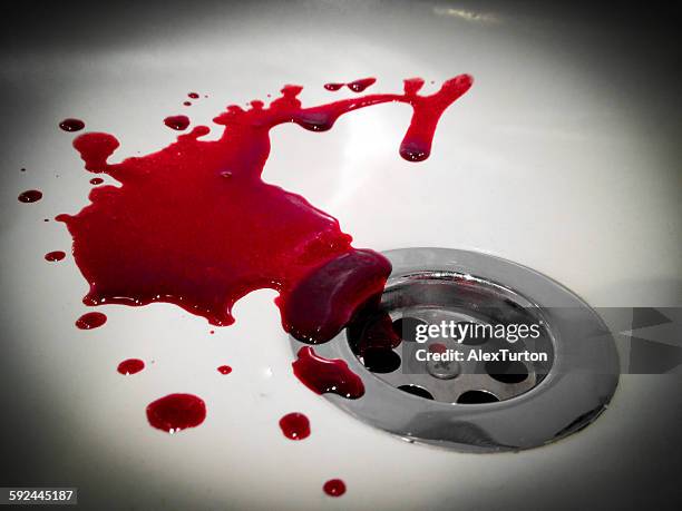 blood circling a plug - insanity stock pictures, royalty-free photos & images