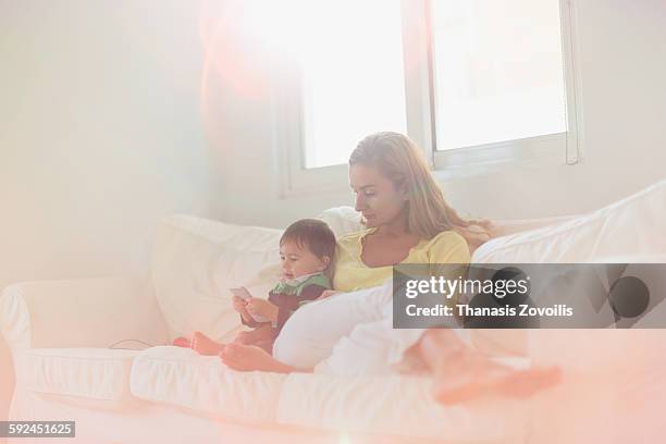 mother with her son - overexposed stock pictures, royalty-free photos & images