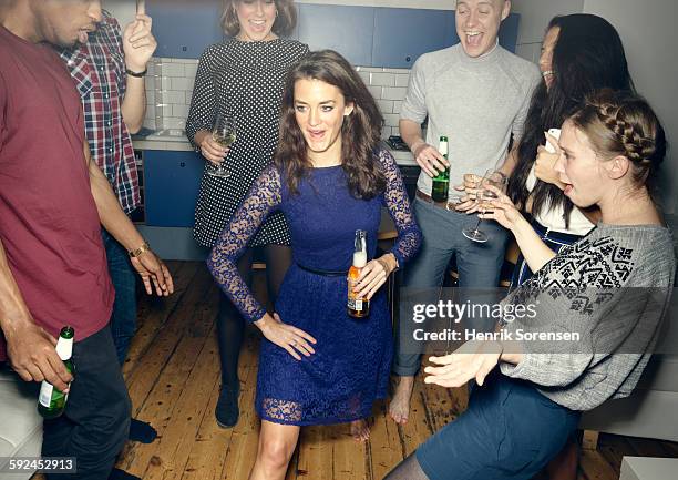 group of young people having a party - bottles glass top stock pictures, royalty-free photos & images