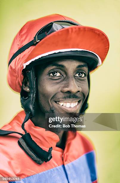 jockey with helmet and goggles - racing silks fotografías e imágenes de stock