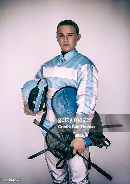 female jockey with saddle and helmet - racing silks fotografías e imágenes de stock