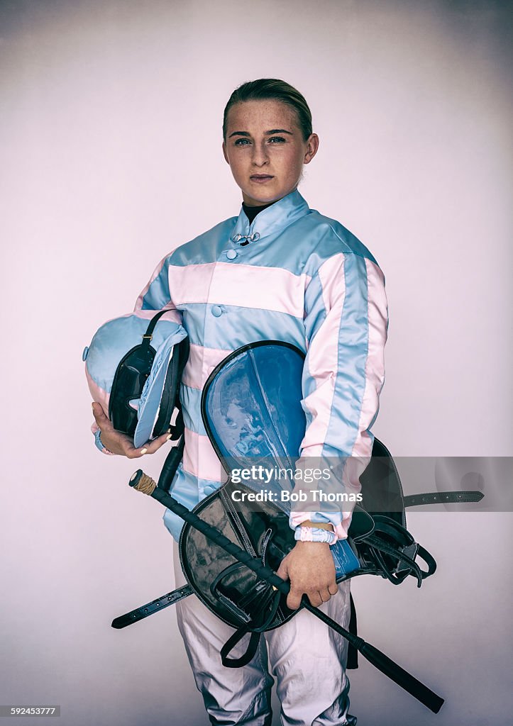Female Jockey with Saddle and Helmet
