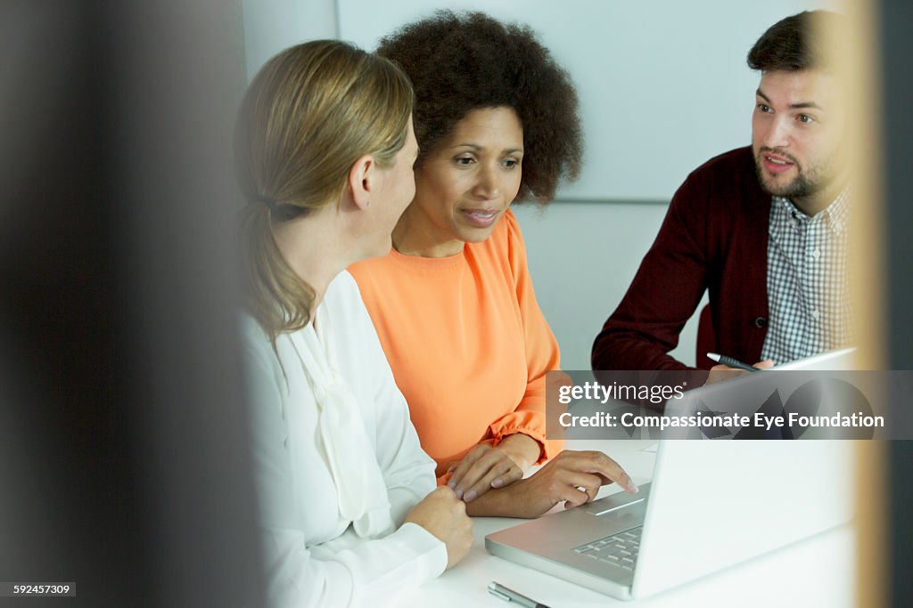 Business people talking in meeting